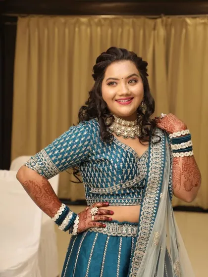 A confident pose from the client, showing how the right jewellery can elevate the entire outfit.