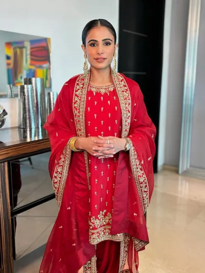 The beautiful Minal, ready for her pre-wedding Path ceremony. I created a clean, radiant makeup look with a sleek bun that looked absolutely regal with her traditional red outfit.