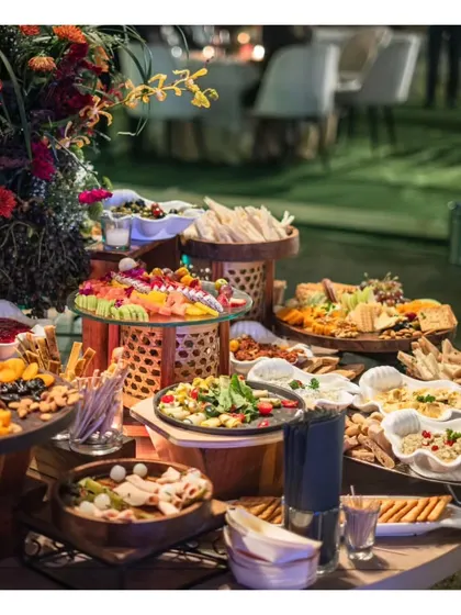 A feast for the eyes and the palate. Our bountiful grazing tables are artfully arranged with a lavish selection of international cheeses, charcuterie, fresh fruits, artisanal breads, and dips, creating a stunning centerpiece for social gatherings.