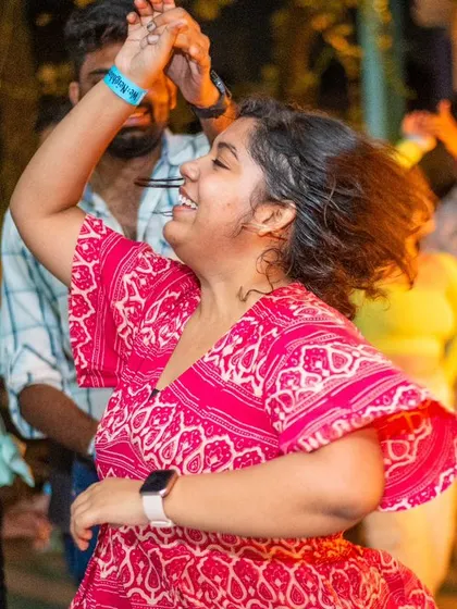 The joy of a perfectly executed spin. You can feel the happiness radiating from the dance floor.