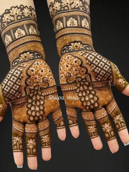 A full coverage design featuring large peacock motifs, with lotus details on the fingers.