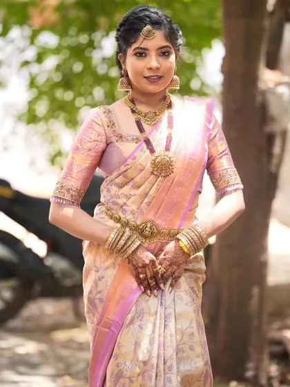 A full-length view of Harshitha's elegant housewarming outfit.