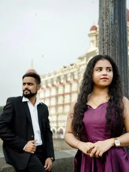 A pre-wedding shoot with the iconic Taj Mahal Palace Hotel in Mumbai as the backdrop, creating a grand and timeless portrait.