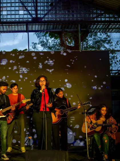 A full student band on stage at our annual showcase. From rehearsals to the spotlight, we guide our students every step of the way.