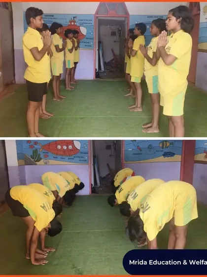 Young athletes from Mrida Education and Welfare Society begin their yoga session with a prayer. This integrates a sense of mindfulness and respect into their practice.