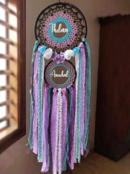 This Galaxy Themed Dreamcatcher was a custom creation for 'Thelma' and 'Aanchal'. The blend of black, purple, pink, and blue evokes the mystery and beauty of the night sky.