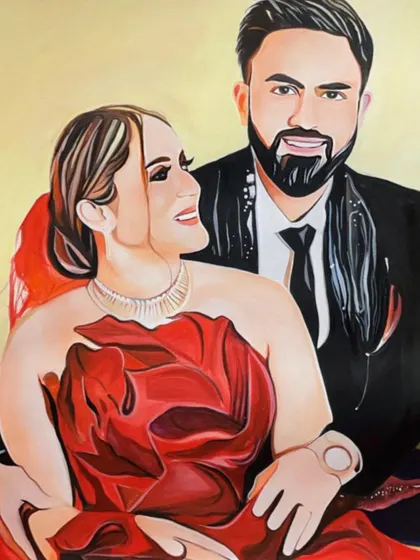 A completed 16x23 inch custom portrait of a couple. The vibrant red dress and the warm background were chosen to create a romantic and celebratory feel, perfect for an anniversary or wedding gift.