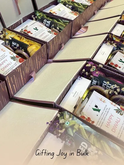 Gifting joy in bulk is my specialty. Here's another angle of a large corporate order, highlighting the uniform and professional presentation of each hamper, designed to make a lasting impression.