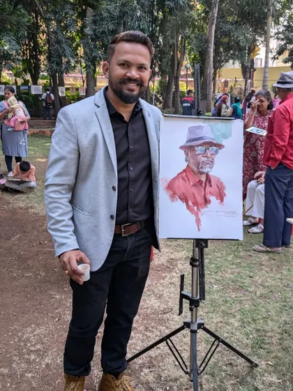 Posing with my completed portrait after a demonstration at the Kalakari 4 festival in Satara. It was a beautiful day to paint outdoors.