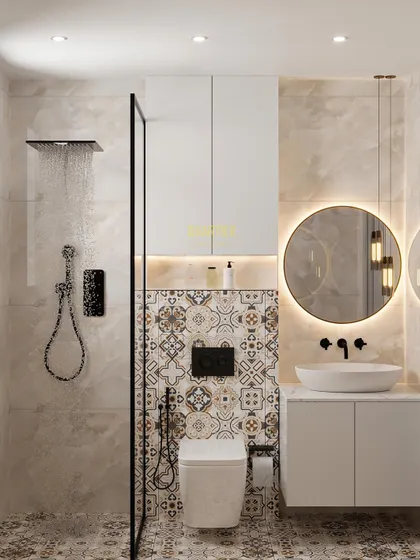 A guest washroom design that blends Moroccan flair with modern sophistication. The floor and accent wall feature beautiful Moroccan tiles, while the rest of the walls are clad in sleek Onyx tiles for a harmonious contrast.
