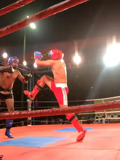 Vipul attempts a jumping knee, showing his athleticism and creativity in the ring.