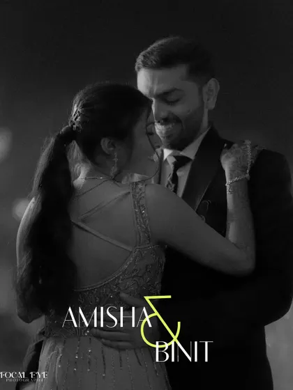 A classic black and white shot of the couple's first dance, capturing the romance and intimacy of the moment.