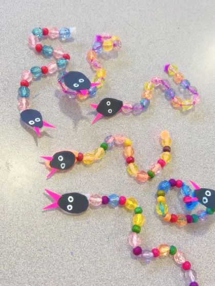 We also used beads to create these slithery, colourful snakes. A fun and tactile craft for young kids.