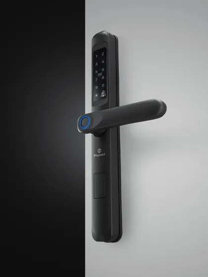 Another utility shot of a different Phynart lock model. The angle highlights the handle's design and the keypad, showing the product from a practical, user-focused perspective.