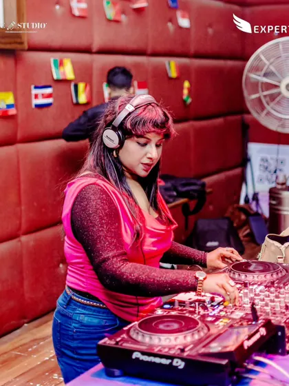 At the console at Vapour Indiranagar for a Sunday session. The red padded walls and international flags created a unique and intimate setting for a retro Bollywood night.