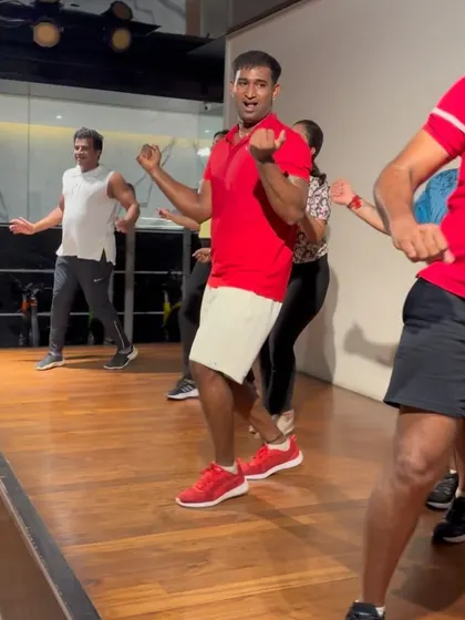 Close-up shot of me leading the dance, showing the energy and fun.