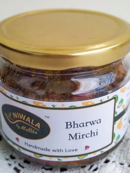 My Bharwa Mirchi pickle, made with large red or green chilies stuffed with a blend of aromatic spices. It’s a traditional favourite that provides a burst of flavour with every bite.