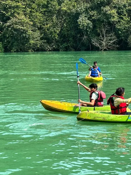 Kayaking on the Kali river in Dandeli. We also organize thrilling water sports adventures for groups.