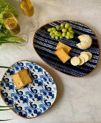 These mango wood plates from our Bali Collection feature two different traditional Batik prints. Their organic shapes and rich indigo patterns are perfect for serving appetizers or creating a stylish cheese board.