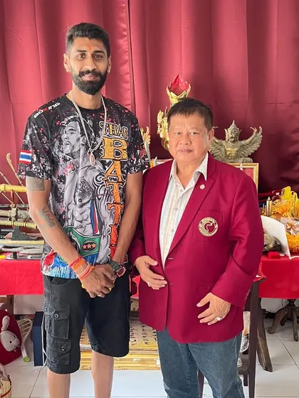 In my master's home, surrounded by the history and tradition of Muay Thai. This is where the real knowledge is passed down.