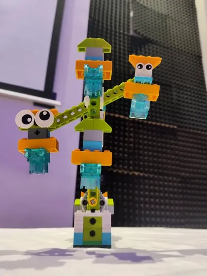 A close-up of a creative, multi-level robotic structure built by one of our imaginative students.