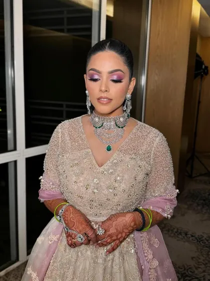 A close-up of the makeup and sleek hair for a glamorous engagement event.