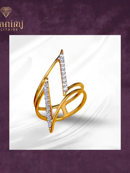 A modern ring with a sharp, architectural design. This piece features two parallel bars of diamonds set in yellow gold, creating a look that is both abstract and eye-catching.