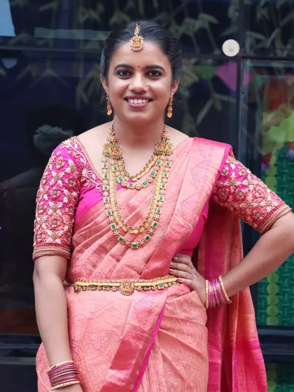 A happy smile makes the look complete. Here you can see a closer view of the makeup, with an emphasis on clean, radiant skin and defined eyes for her traditional event.