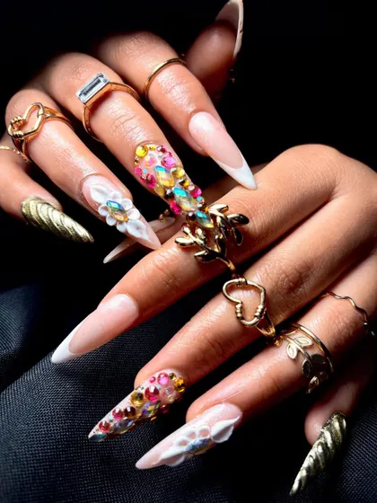 This angle captures the light hitting the rhinestones and the metallic gold, showing the full sparkle of the design.