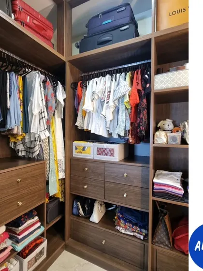 This is the 'after' of a walk-in closet transformation. The goal is always practicality. We created a system that is not just aesthetically pleasing but, more importantly, easy for the client to maintain.
