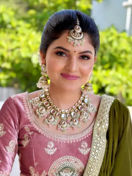 A beautiful portrait of Raman Preet. Her minimalist makeup look enhances her natural features, creating a timeless bridal style.