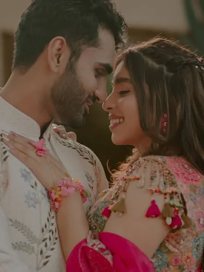 An intimate close-up of the couple during their Haldi event, lost in each other's eyes.