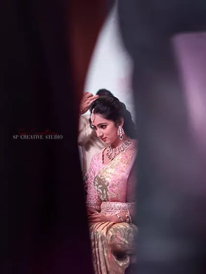 A creative portrait of the bride captured through a prism, creating a beautiful and unique light effect.
