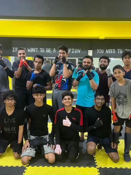 A shot of the team after a tough session, showing the grit and determination we value.