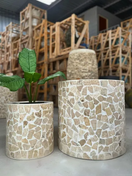 A special moment for my terrazzo planters. This pair of cylindrical pots features a beautiful mosaic of natural stone chips.