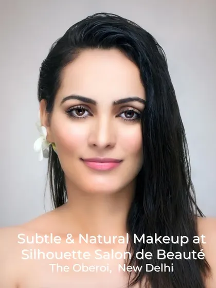 The essence of our philosophy is enhancing, not masking. This is our signature subtle and natural makeup, focusing on creating a dewy, luminous complexion with softly defined eyes and a neutral lip, perfect for an effortlessly polished look.