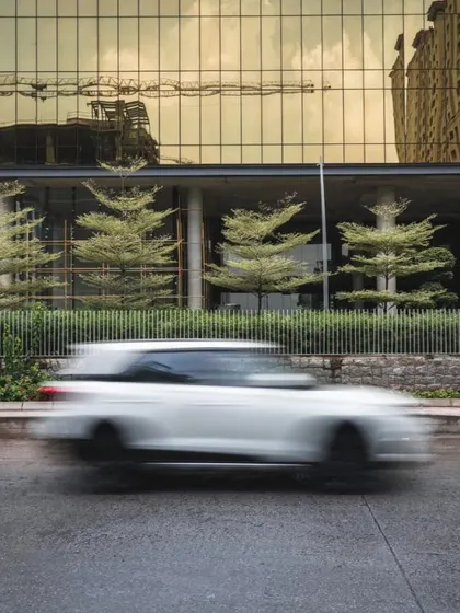 In a tech campus filled with grey and blue buildings, we designed this rectilinear amenity building in a striking gold. The reflective facade captures the surrounding environment, including the motion of traffic, giving the structure a dynamic and unique identity.