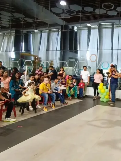 Here I am, performing for a wonderful audience of children and adults at Opus Consulting Services. My workshops are a great fit for corporate family days and events, bringing everyone together for a shared experience of wonder and fun.