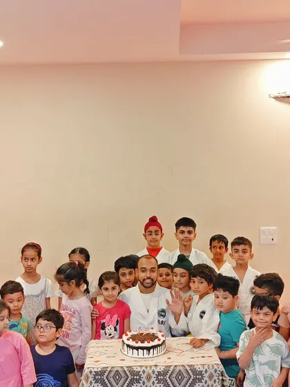 Waving to the camera with my students. These celebrations are a wonderful break from our intense training.