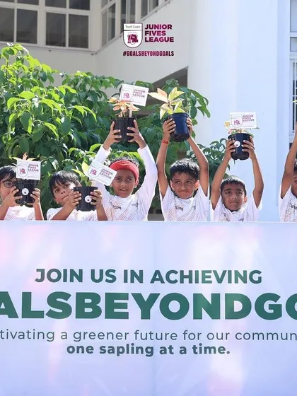 My 'Goals Beyond Goals' initiative in action. I believe in using sports for social good, and at our youth leagues, every team participates in activities like planting saplings to cultivate a greener future for our community.