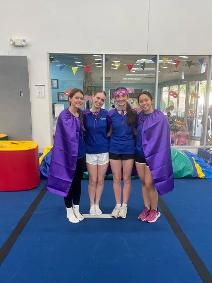 The purple cape crusaders are all smiles. We love dressing up and creating a fun, imaginative atmosphere for our themed parties and events.