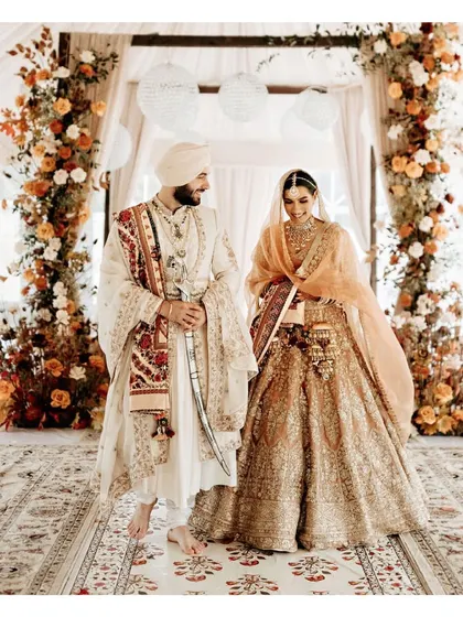 The best thing to hold onto in life is each other. This couple, in their beautiful wedding attire, is ready to hold on for a lifetime.