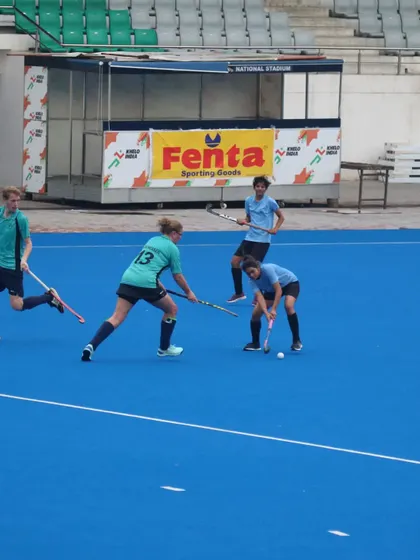 Midfield play during a competitive match. My players are constantly moving, looking for openings and supporting their teammates.