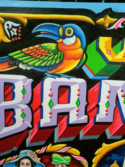 A close-up of the toucan from the "Villa Bam Bam" painting, a piece commissioned by a client in France.