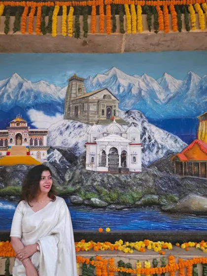 Here I am with a beautiful mural depicting the essence of Uttarakhand's spiritual heritage. Incorporating local art like this is how I ensure a space tells a story and connects with its roots.
