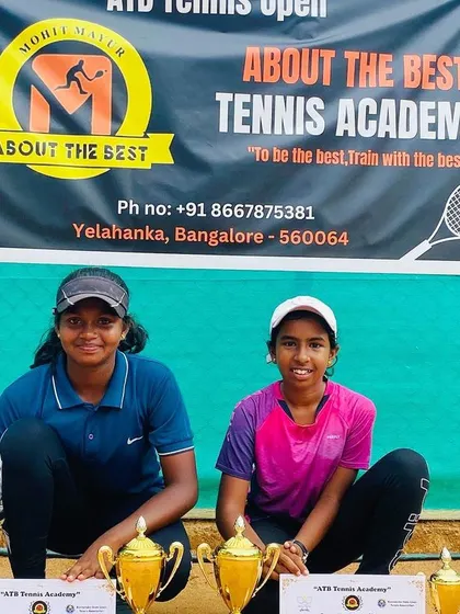 Two young champions with their trophies after the final of the ATB Open. We provide a platform for budding stars to showcase their talent.