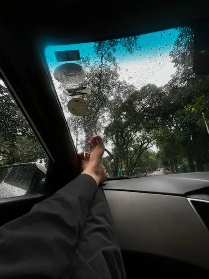 The perfect rainy day road trip view. This shot captures the cozy feeling of watching the rain from inside the car.
