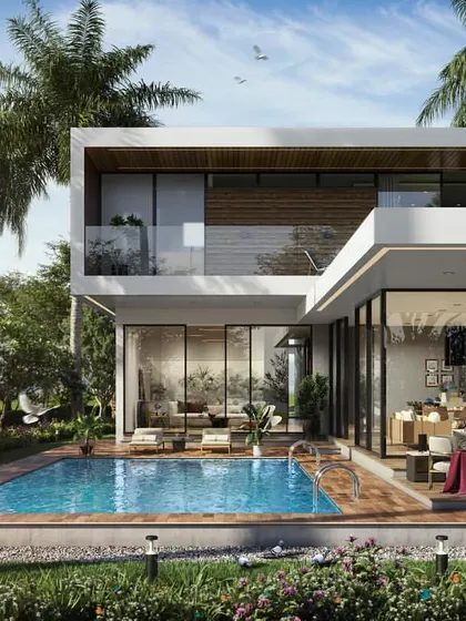 The same modern villa rendered in bright daylight. This version highlights the lush tropical landscaping, the clear blue water of the pool, and the material finishes of the home's exterior.