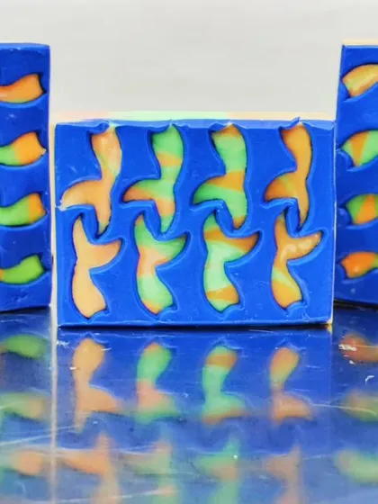 A tessellation-style peekaboo soap with interlocking bird shapes.