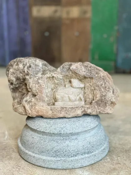 A small niche carving of Nandi is displayed on one of our granite plinths, showing how you can highlight these unique pieces.